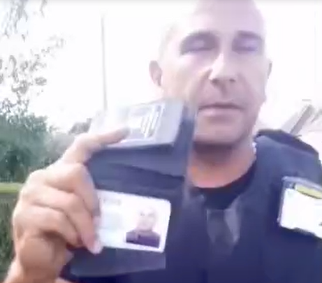 Bailiff flashes fake police-like badge